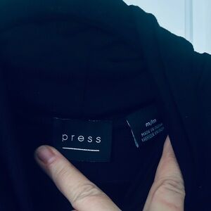 Press long sleeve turtle kneck Black Women's Top. Long with kangaroo pouch